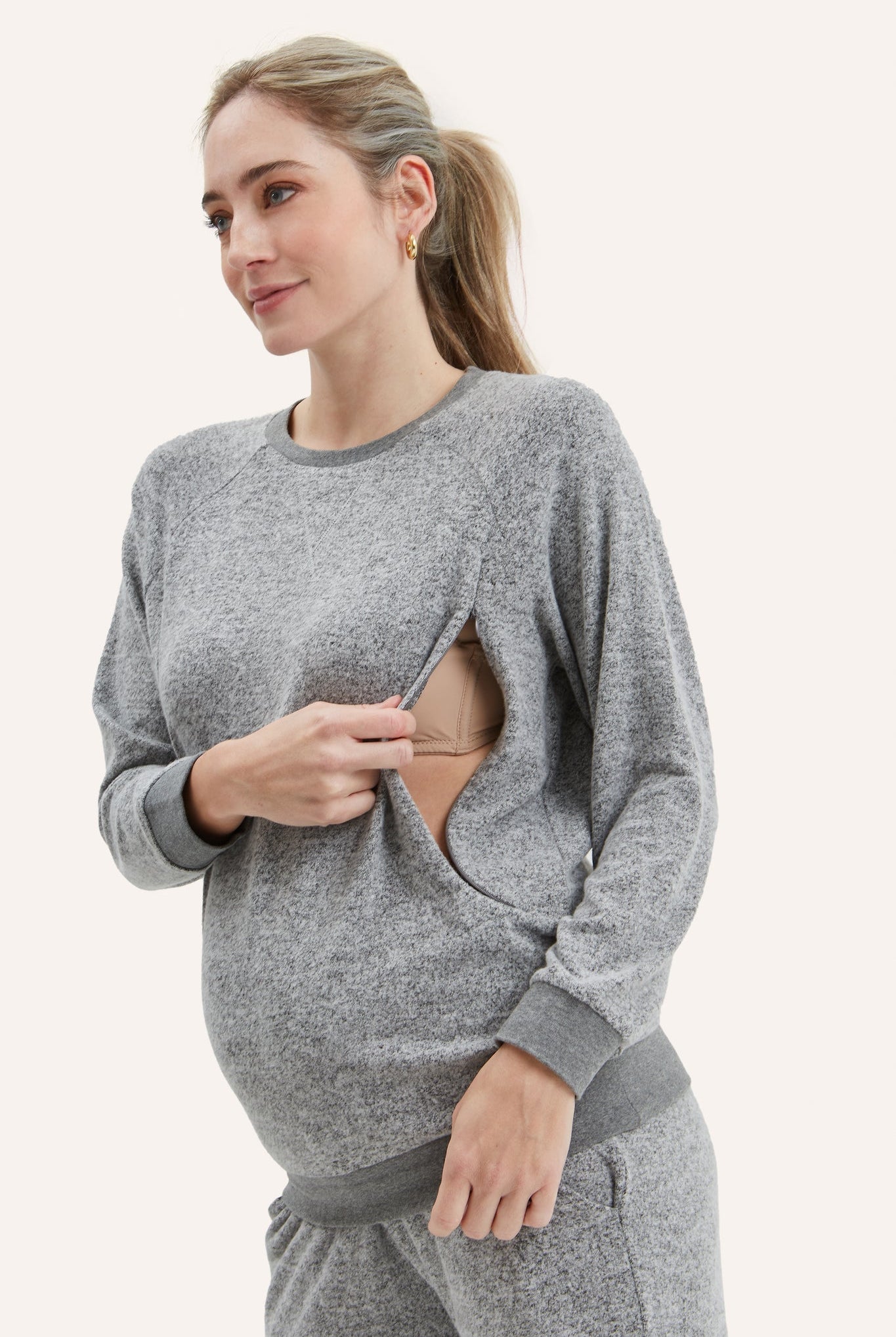 NOM Maternity Heart On My Sleeve Nursing Sweatshirt in Grey, showing nursing access