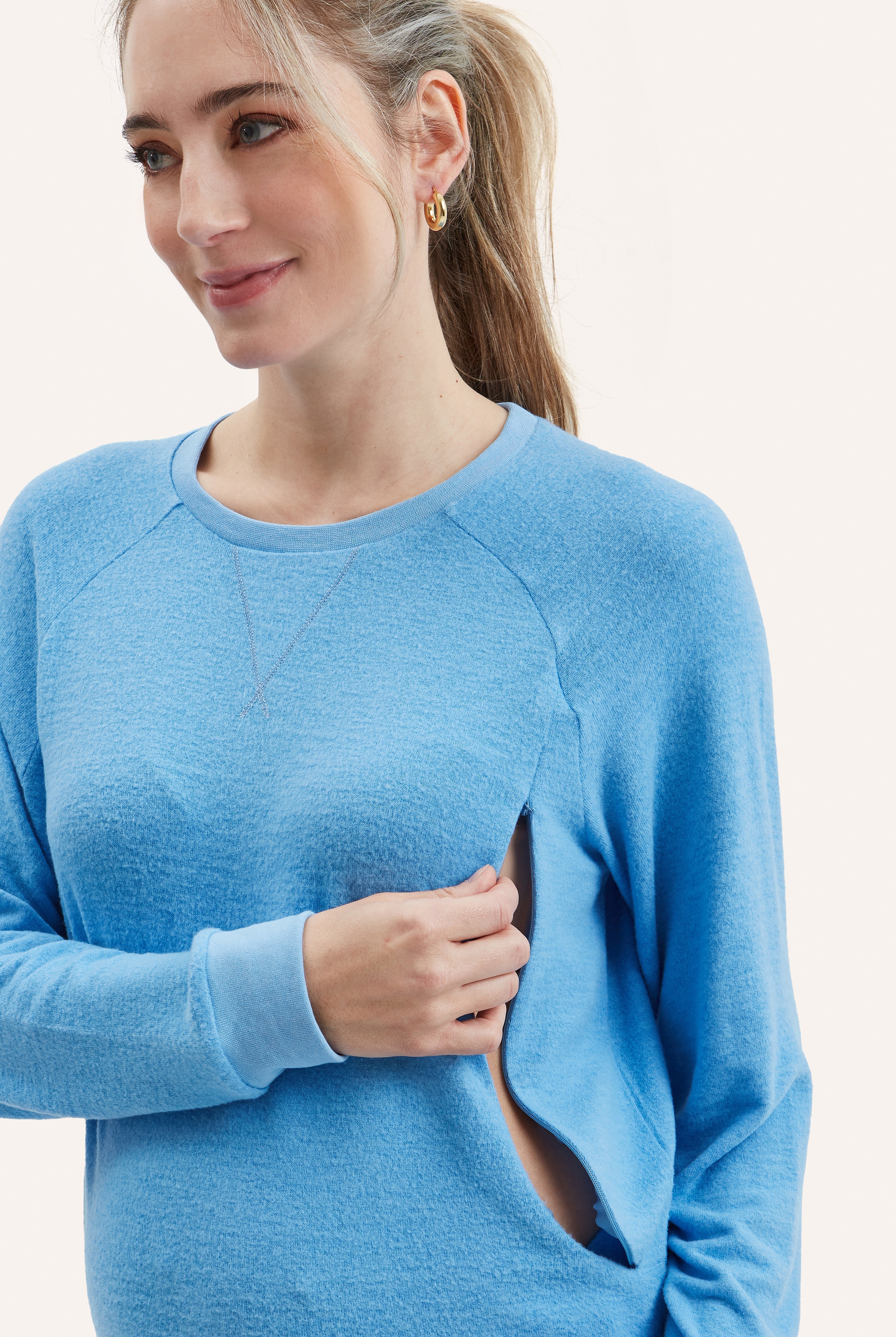 NOM Maternity Heart On My Sleeve Nursing Sweatshirt in Bluebell, showing nursing access