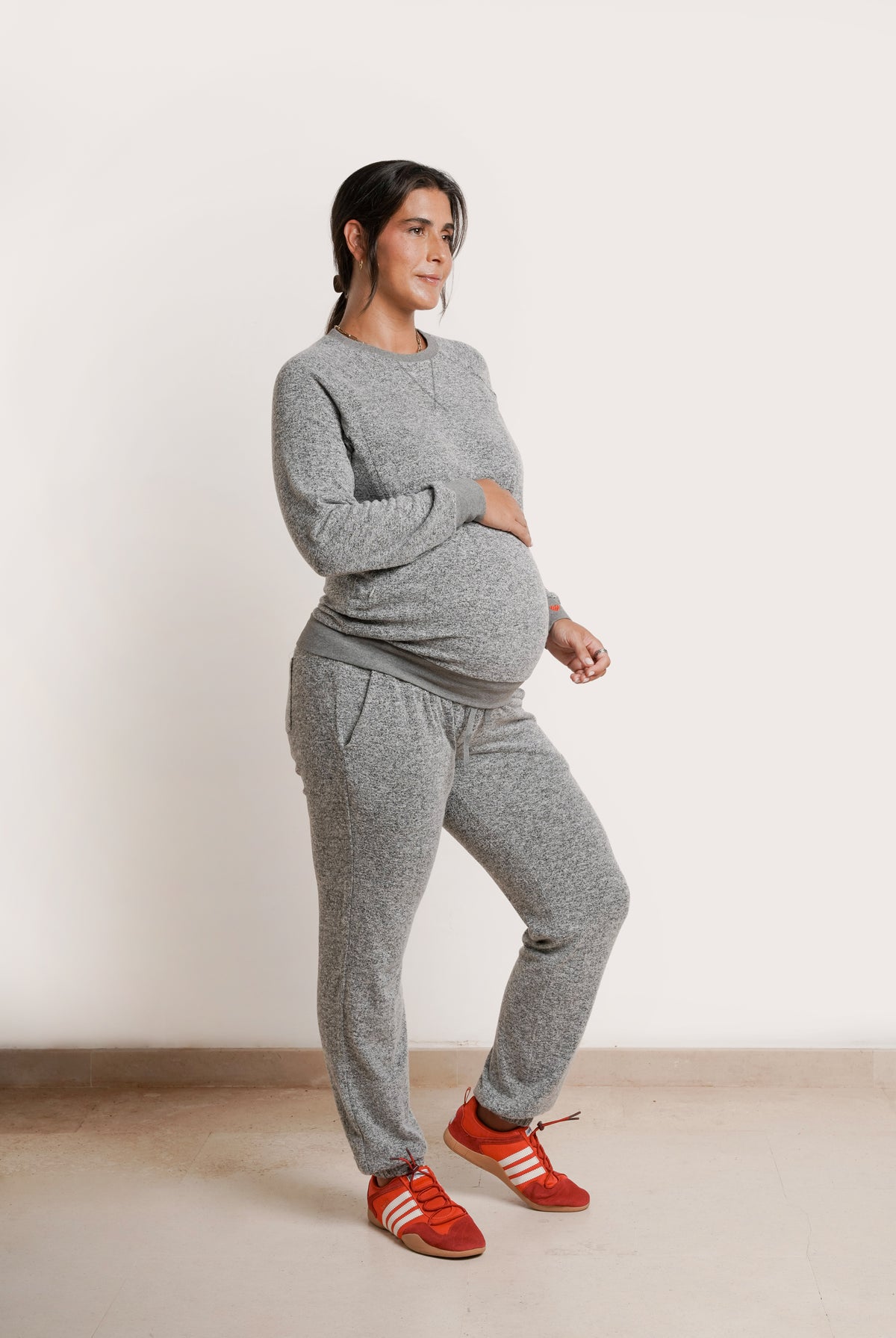NOM Maternity Heart On My Pocket Sweatpants in Grey, side view showing cuffed legs and pocket