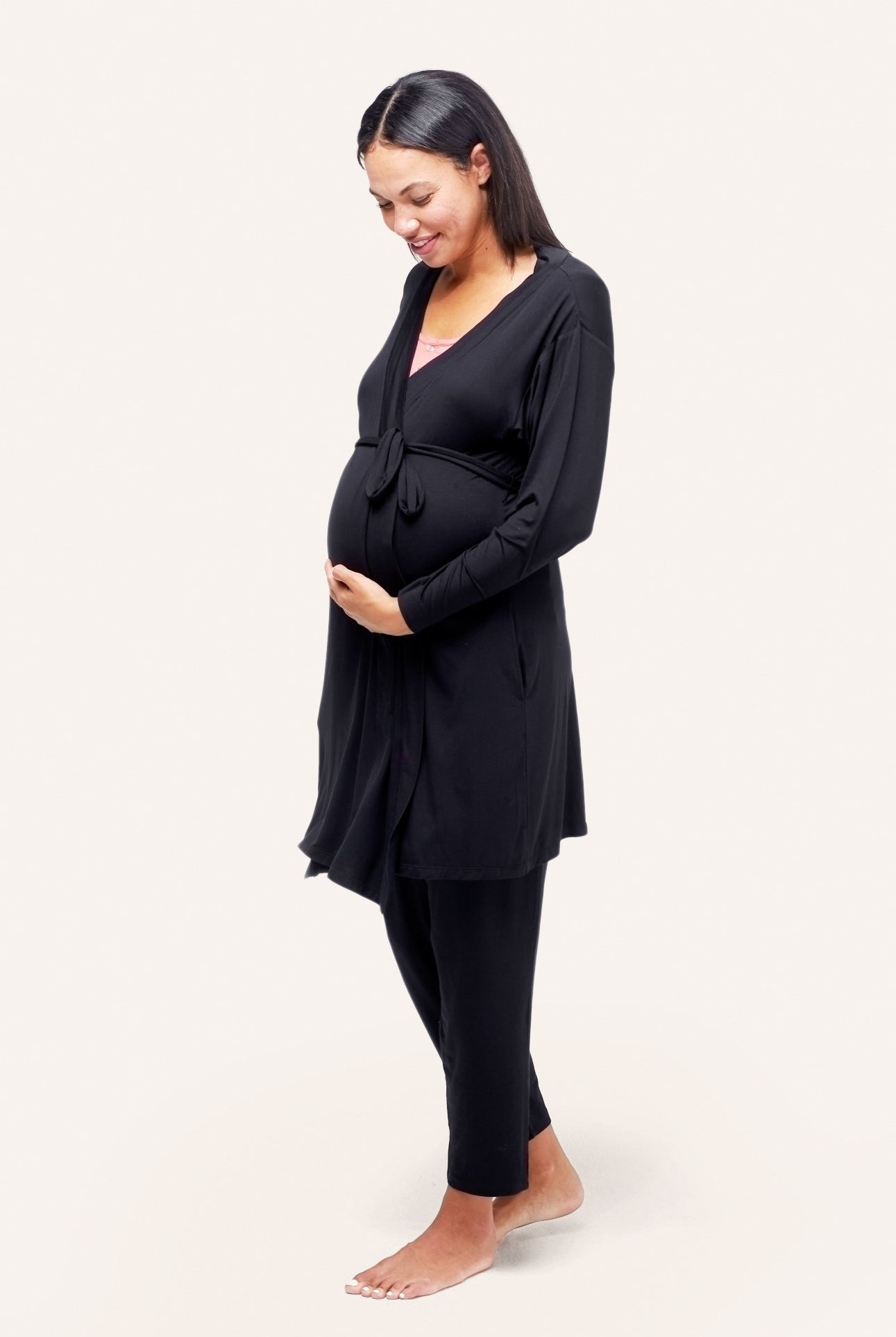 NOM Maternity Second Skin Robe in Black, three-quarter view with bump