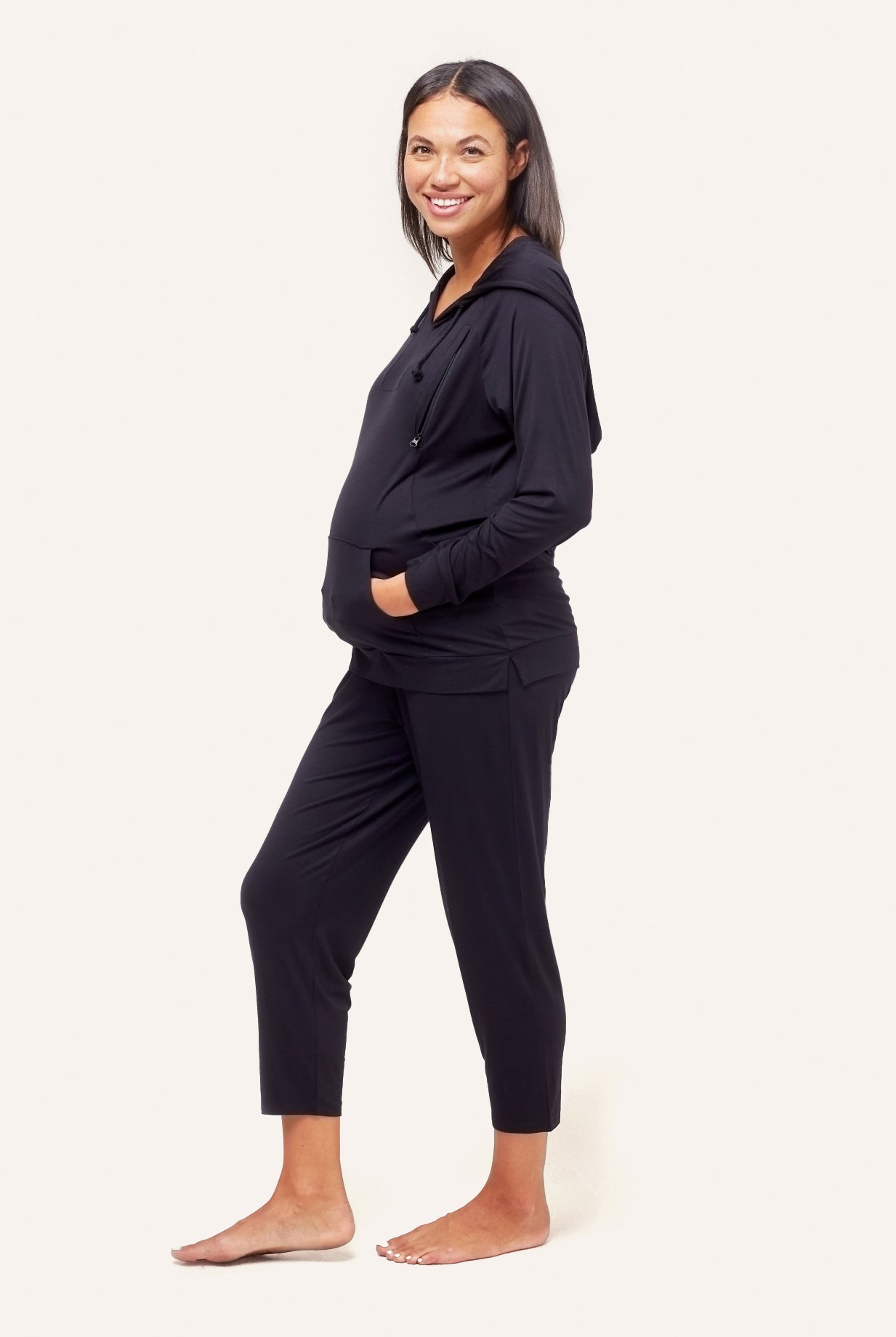 NOM Maternity Simone Hoodie in Black, side view with bump