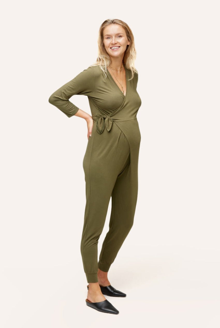 NOM Maternity Amabella Jumpsuit in Olive, three-quarter view with bump