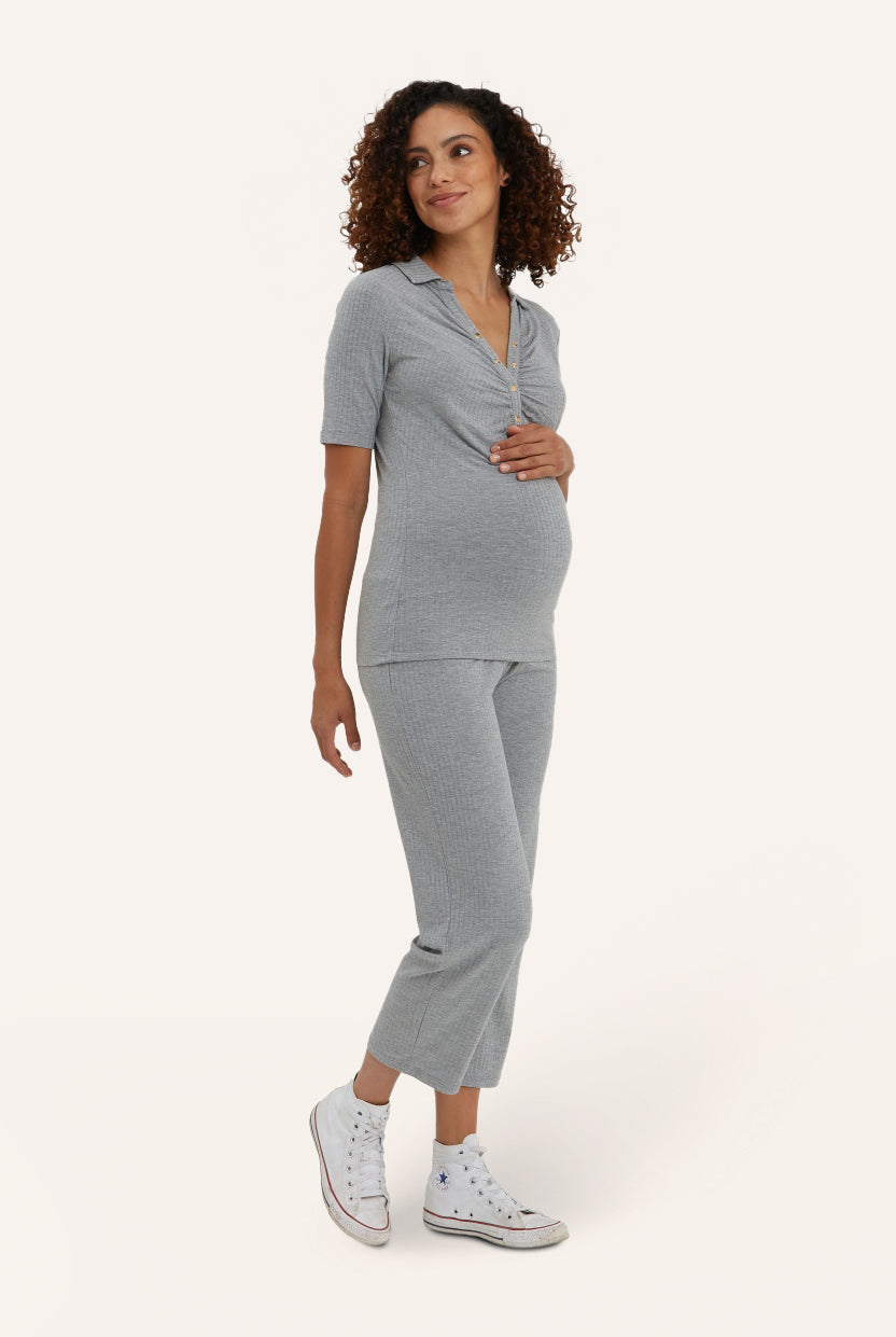 NOM Maternity Camilla Pant in Heather Grey, three-quarters view with bump
