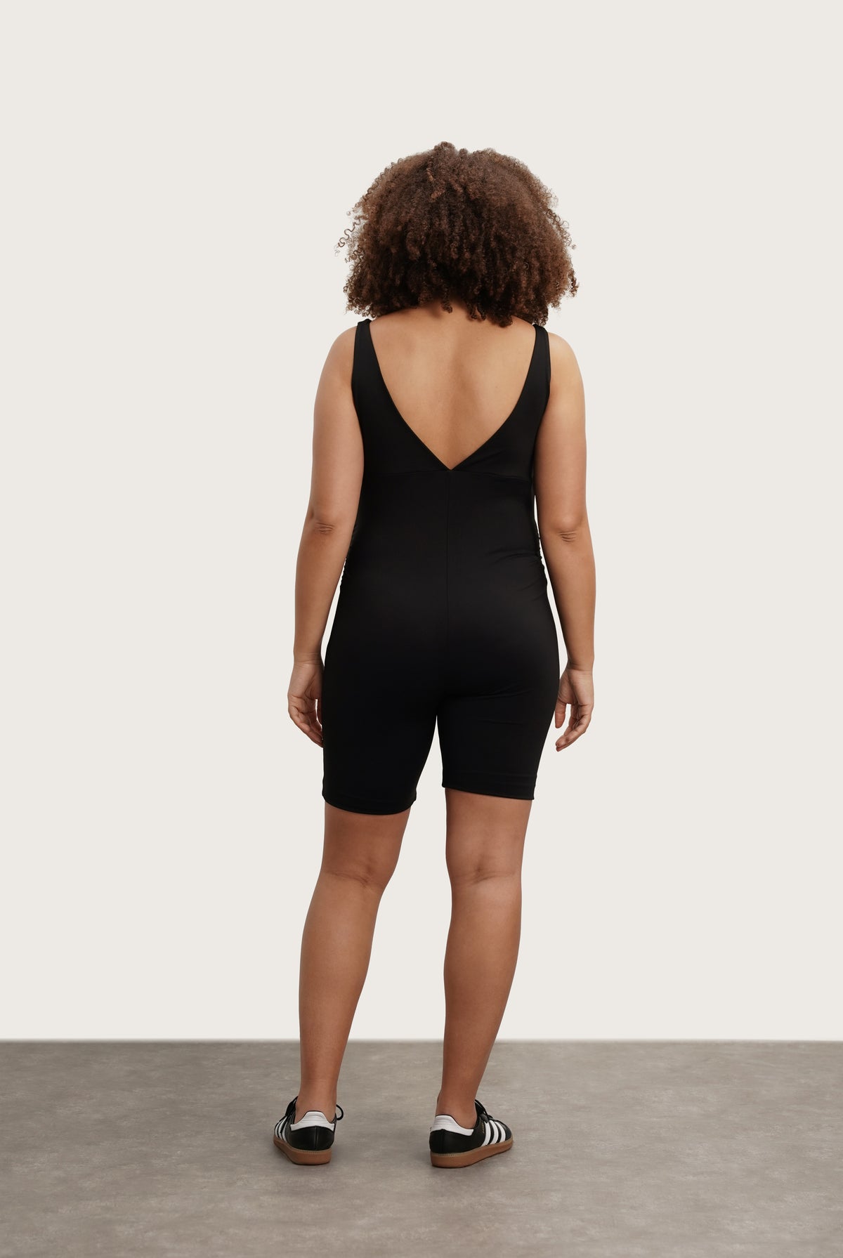 NOM Maternity Stretch & Support Romper in Black, back view