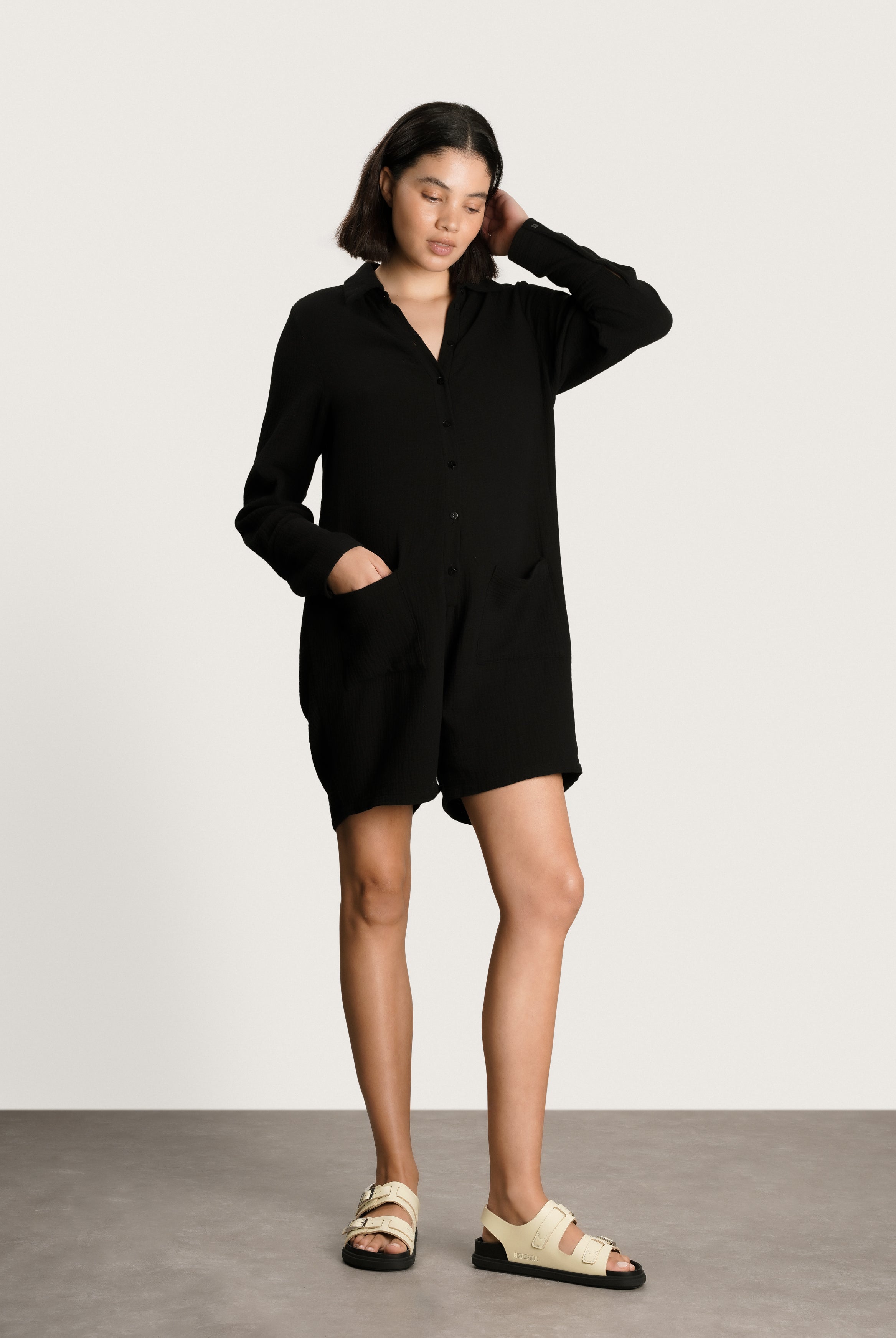 NOM Maternity Juniper Cotton Romper in Washed Black, full front view showing buttons, pockets, relaxed fit
