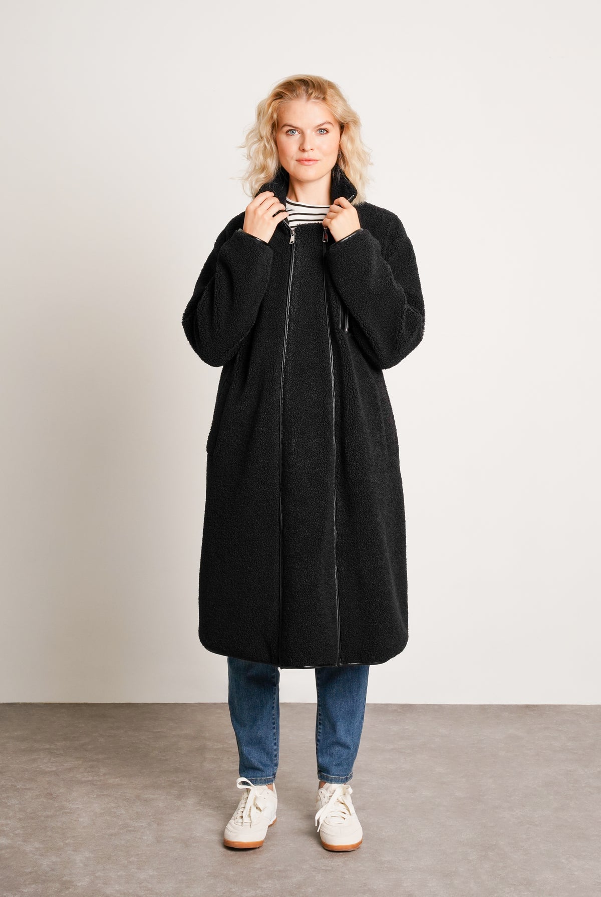 NOM Maternity Teddi Coat in Black, front view showing zipper panel closed