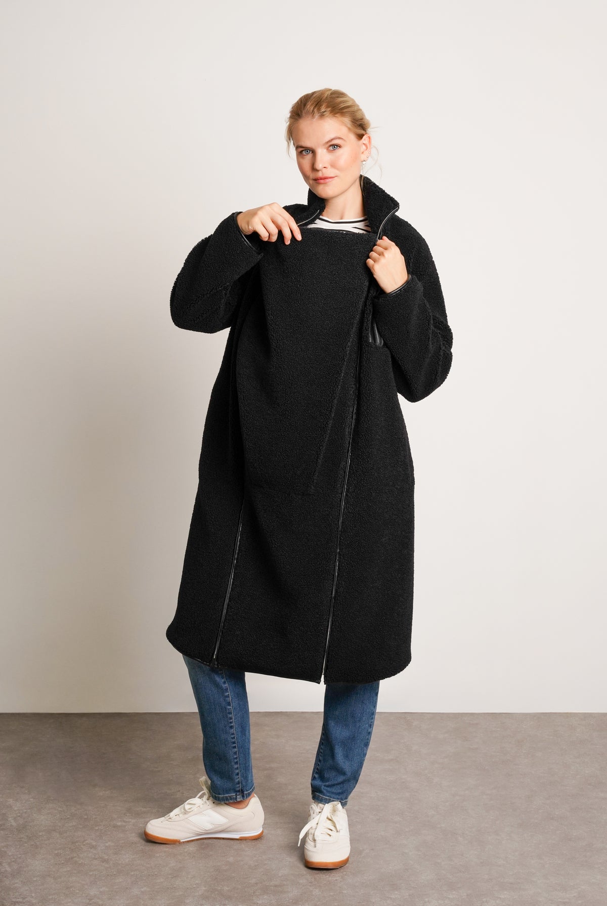NOM Maternity Teddi Coat in Black, front view showing zipper panel open