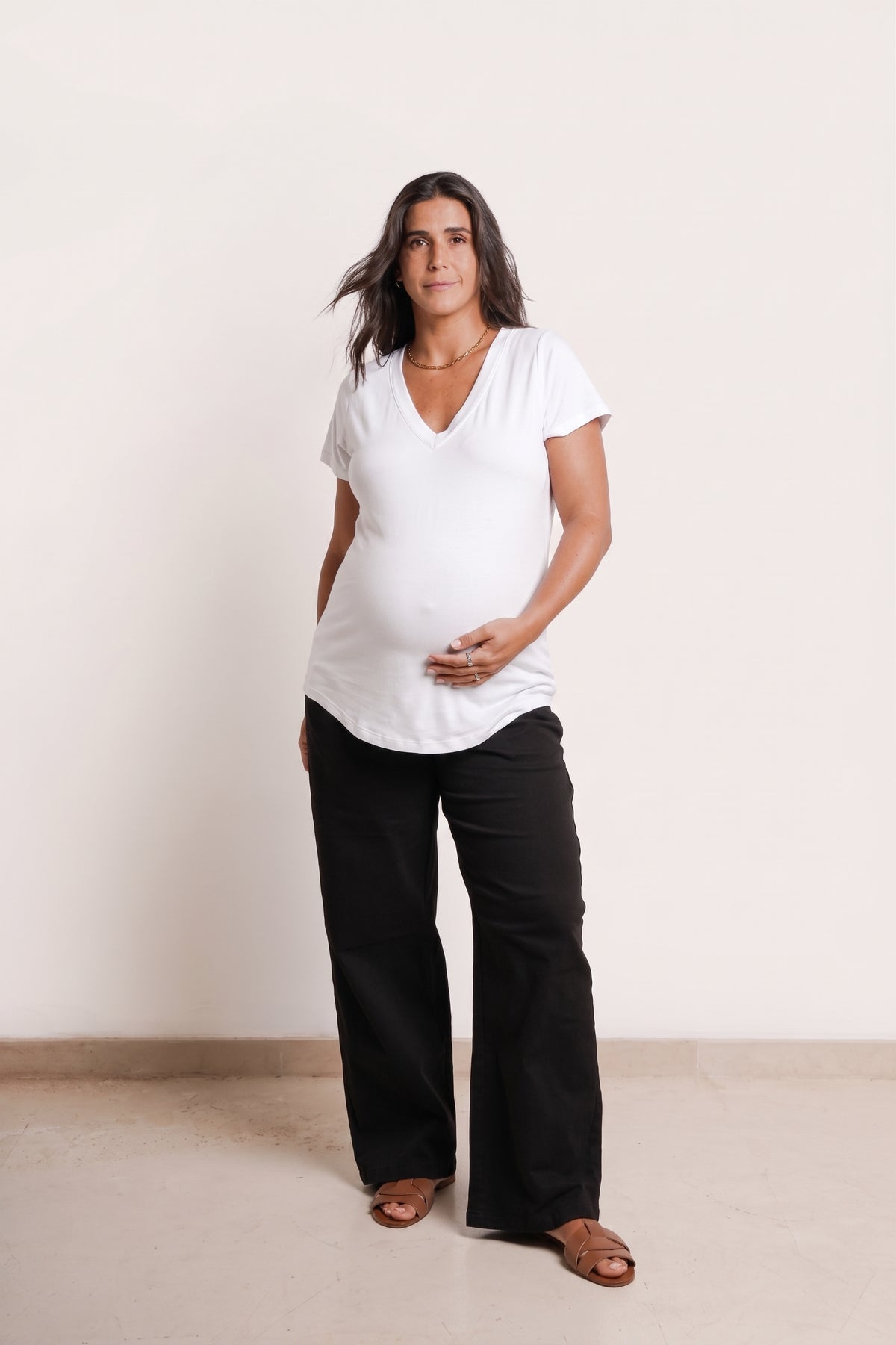 NOM Maternity The Nursing Tee in White, full front view with bump