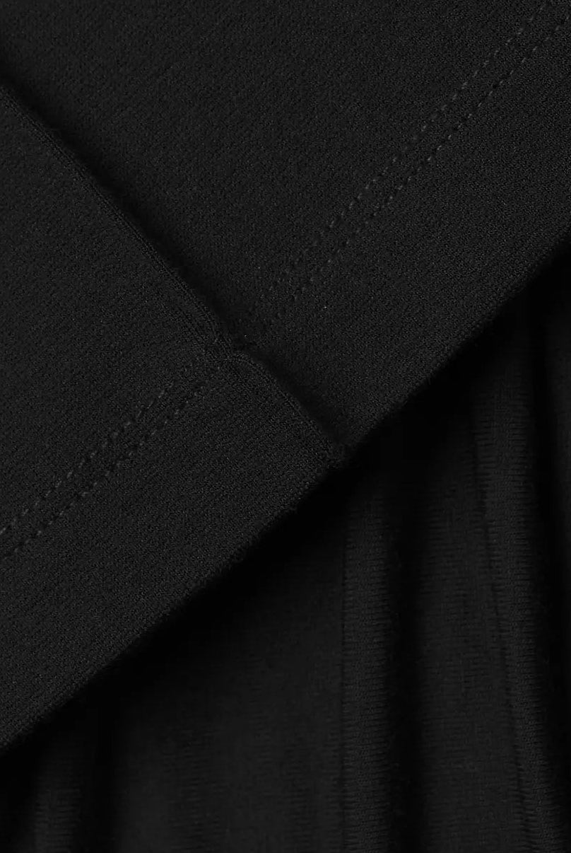 NOM Maternity London Pant 4 Way Stretch in Black, fabric and hem close-up view