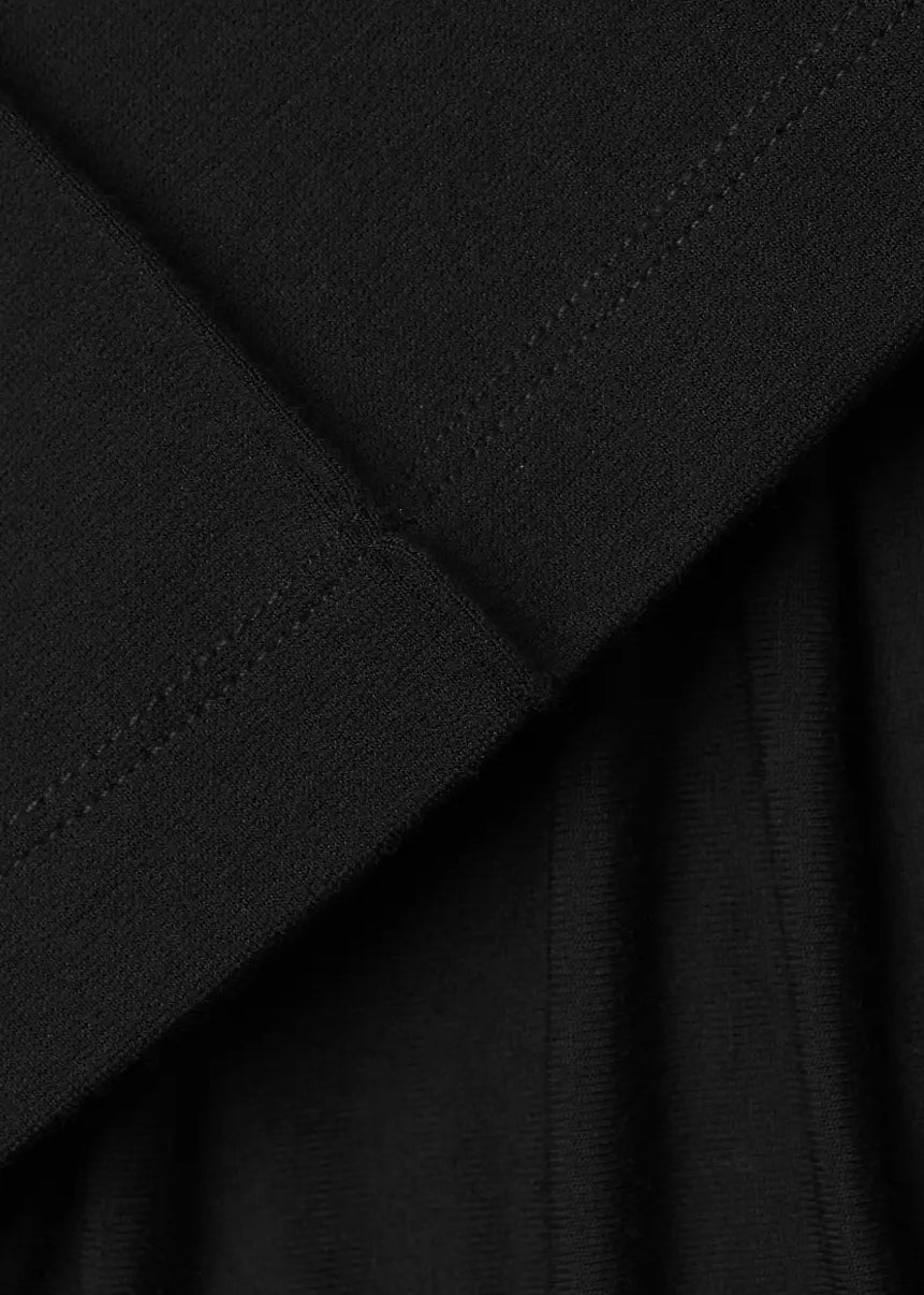 NOM Maternity London Pant 4 Way Stretch in Black, fabric and hem close-up view