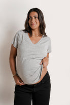 NOM Maternity The Nursing Tee in Heather Grey, relaxed view showing 
v-neckline, with bump
