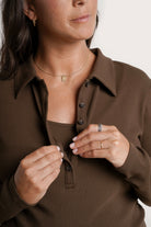 NOM Maternity Paige Polo Nursing Tee in Chocolate, close-up view of collar and buttons for nursing access