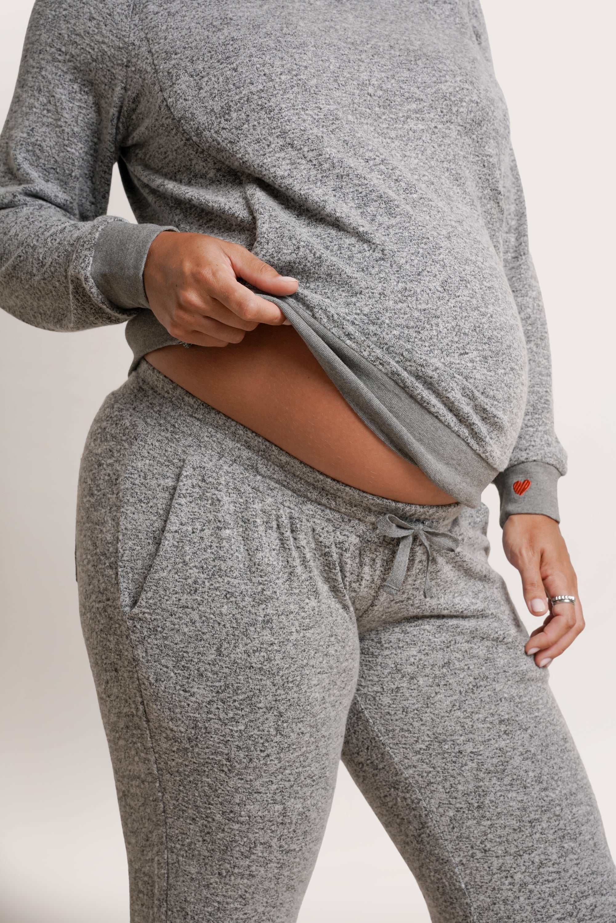 NOM Maternity Heart On My Pocket Sweatpants in Grey, close-up view of waistband and drawstring, with pocket
