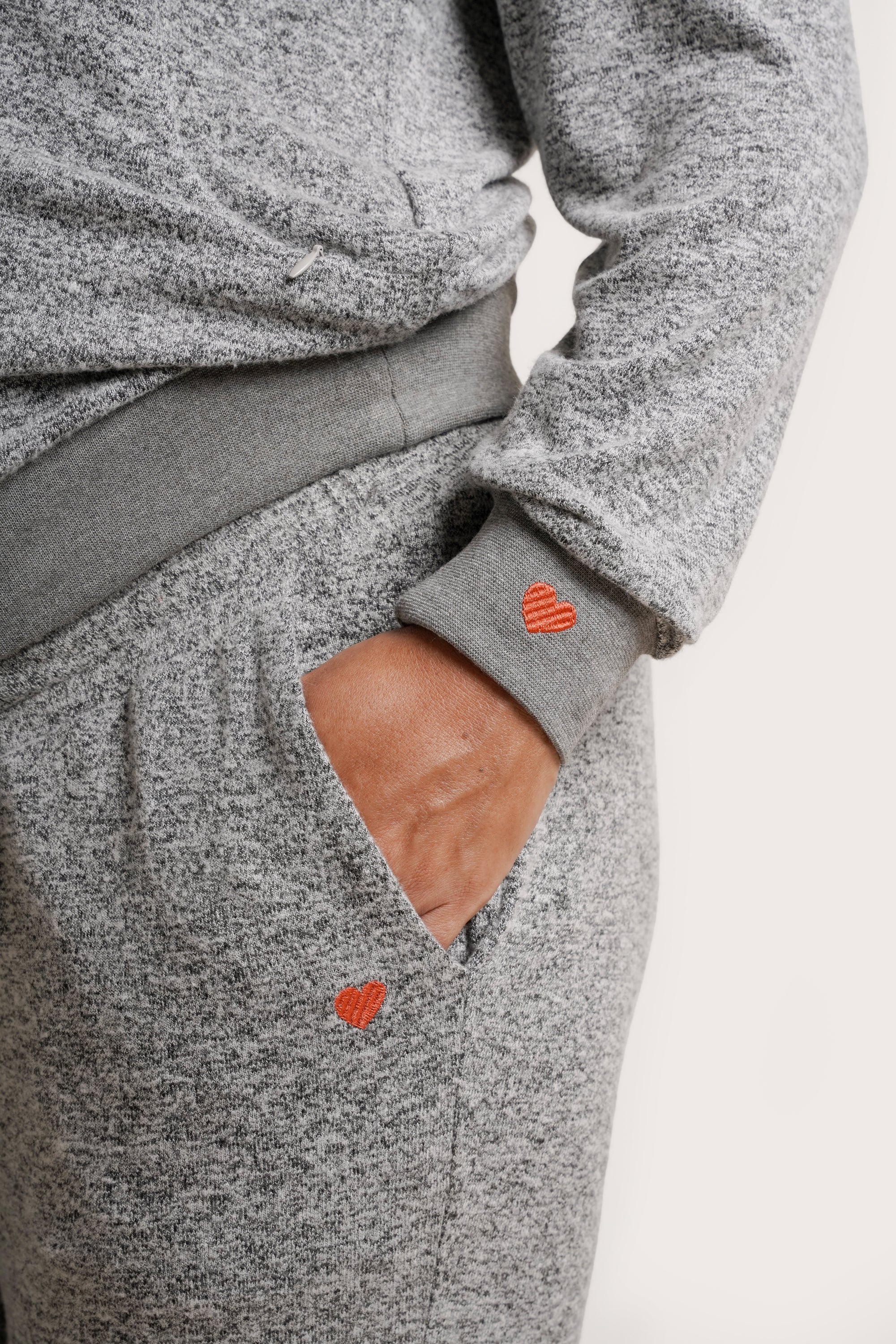NOM Maternity Heart On My Sleeve Sweatshirt in Grey, close-up view of sleeve cuff with heart-shaped embroidery