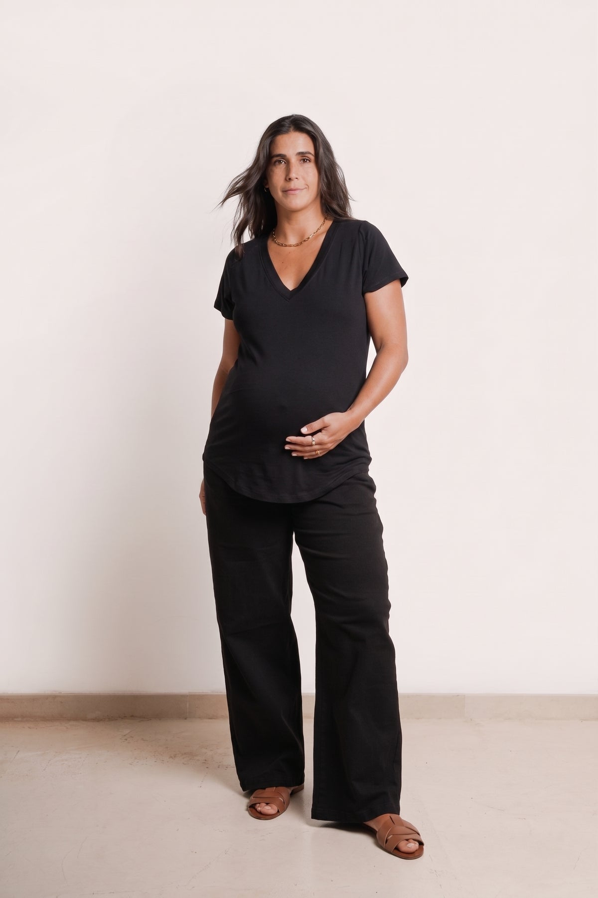 NOM Maternity The Nursing Tee in Black, full front view with bump